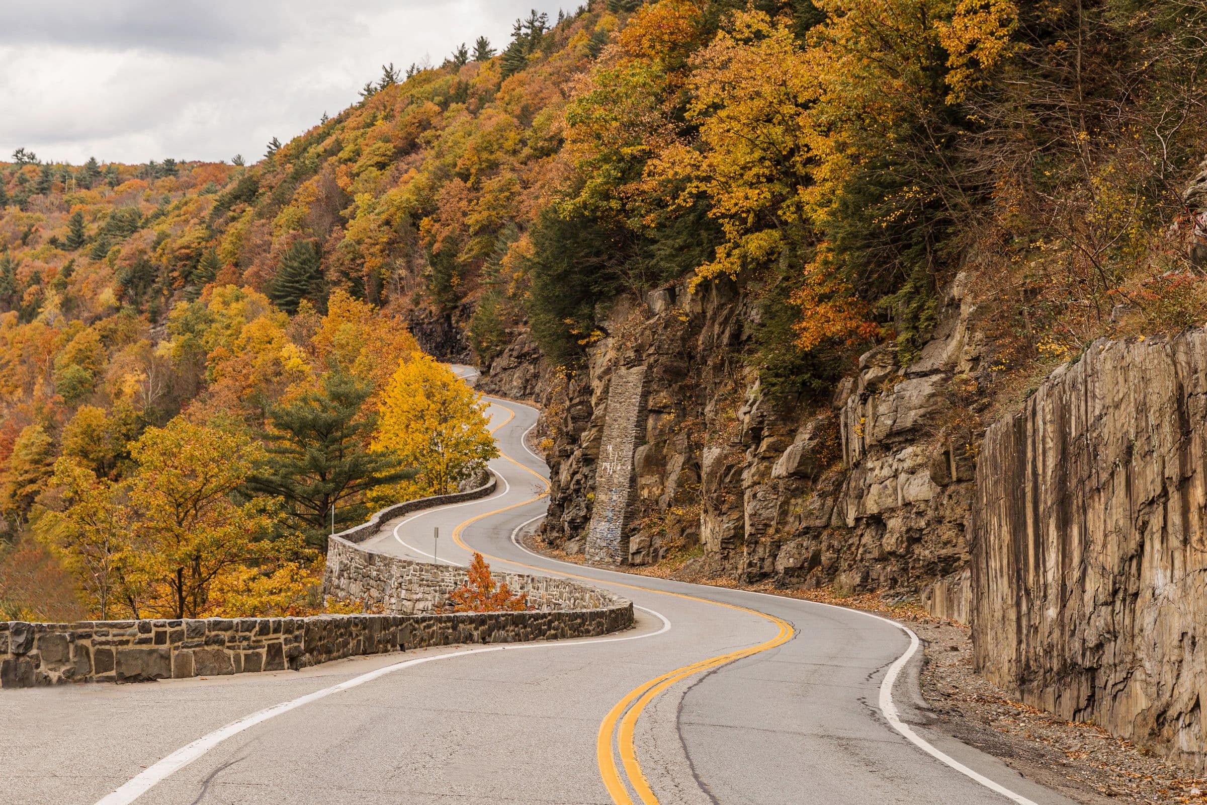 A winding road through the Hudson Valley in autumn
